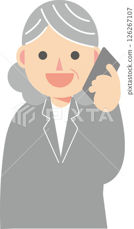 A woman in a suit making a phone call on her smartphone 126267107