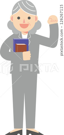 A woman in a suit doing a fist pump and holding a textbook 126267115