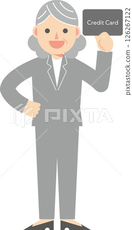 A woman in a suit holding a credit card 126267122