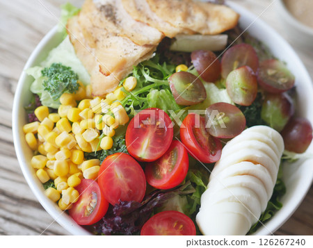Salad decorated with colorful ingredients Salad decorated with colorful ingredients 126267240