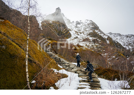 Hiking trail to Svolvaergeita in snowy Svolvaer, Lofoten Hiking trail to Svolvaergeita in snowy Svolvaer, Lofoten 126267277