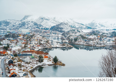 Fishing village of Henningsvaer with snowy mountain backdrop 126267280
