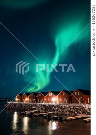 Northern Lights Over Red Cabins in Leknes, Lofoten 126267283
