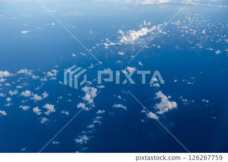 Aerial cloudscaspe picturesque clouds and sky from top view over the horizon Aerial cloudscaspe picturesque clouds and sky from top view over the horizon 126267759