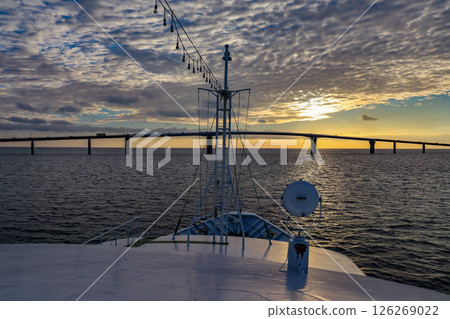 Evening view of Irabu Bridge from a bay cruise on Miyako Island Evening view of Irabu Bridge from a bay cruise on Miyako Island 126269022