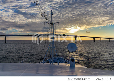 Evening view of Irabu Bridge from a bay cruise on Miyako Island 126269023