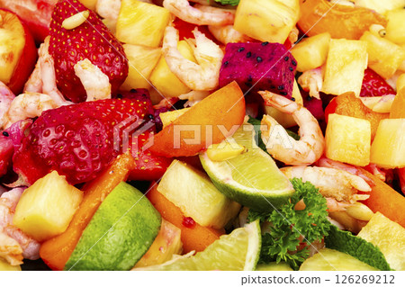 Plate of shrimp fruits salad. 126269212