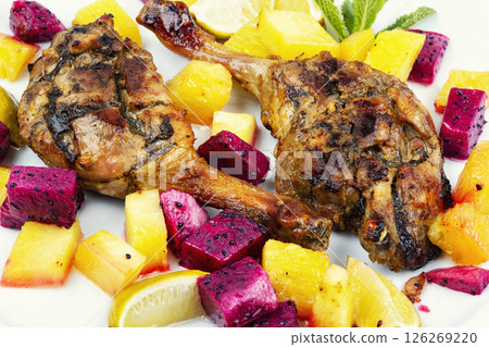 Paleo diet dish of fried duck legs. 126269220