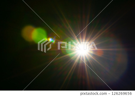 Sun flare on the black background Sun flare on the black background 126269656