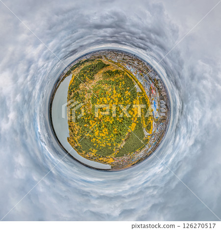 Big lake with green shores in bright sun light, aerial landscape. Recreation concept. Aerial view. Little planet sphere mode. 126270517