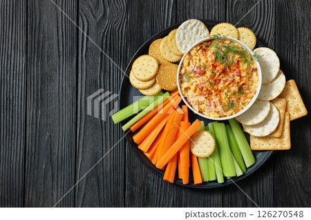 pimento cheese dip served with crackers, veggies pimento cheese dip served with crackers, veggies 126270548