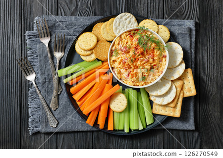 pimento cheese dip served with crackers, veggies pimento cheese dip served with crackers, veggies 126270549