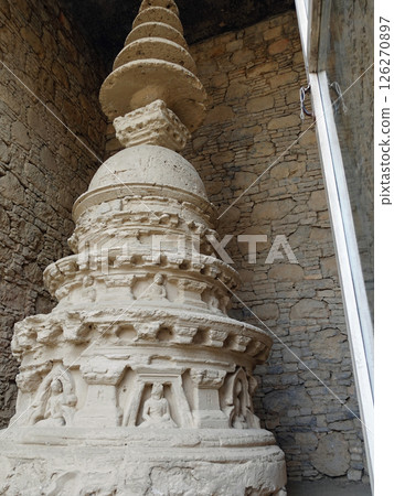 A stupa at the ruins of Mohra Mohradu Monastery near Taxila, a strategic point east of Gandhara in Pakistan A stupa at the ruins of Mohra Mohradu Monastery near Taxila, a strategic point east of Gandhara in Pakistan 126270897