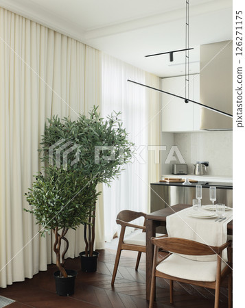 Stylish and Modern Dining Area Featuring an Olive Tree and Beautiful Light Curtains Stylish and Modern Dining Area Featuring an Olive Tree and Beautiful Light Curtains 126271175