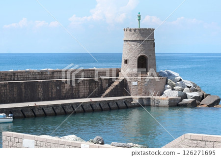 Stone old lighthouse in seafront town of Recco, Liguria. Nature, tourism and recreation, Italy. 126271695