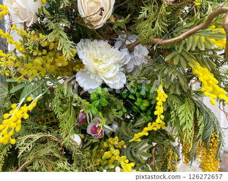 A bouquet of flowers of branches and plants decorated the building A bouquet of flowers of branches and plants decorated the building 126272657