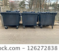 Separate plastic mobile garbage containers for general waste collection 126272838