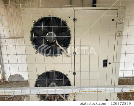 Exterior ventilation equipment on the building, helps to get rid of unstale odor in the kitchen of the premises 126272839
