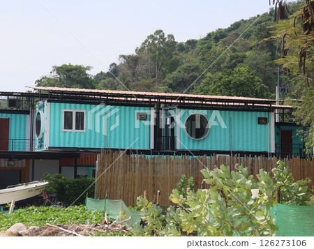 An Innovative Container House Design Set Within the Embracing Arms of Natures Splendor An Innovative Container House Design Set Within the Embracing Arms of Natures Splendor 126273106