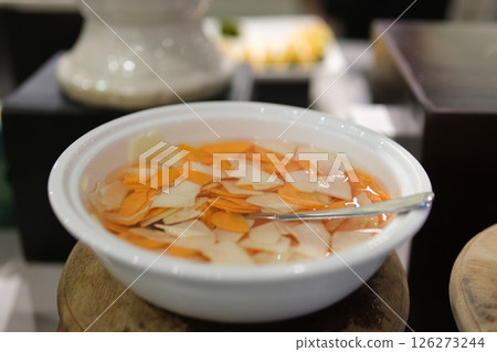 carrot fish sauce Sweet and Sour Chili garlic dipping fish Sauce bowl isolated on white background, top view. pickle carrot and radish Vietnamese fish sauce 126273244