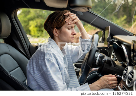 Tired woman stopped after driving car, thinking about life troubles, has panic attack. Burnout 126274551