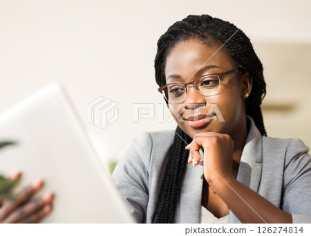Application For Business. Confident African American Businesswoman Using Digital Tablet In Modern Office, Closeup 126274814