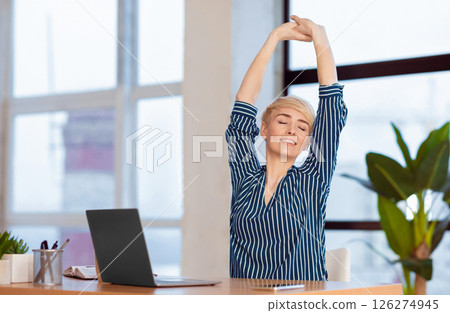 Break At Work. Entrepreneur Lady Stretching Hands With Eyes Closed Working At Laptop Sitting In Modern Office. Selective Focus Break At Work. Entrepreneur Lady Stretching Hands With Eyes Closed Working At Laptop Sitting In Modern Office. Selective Focus 126274945
