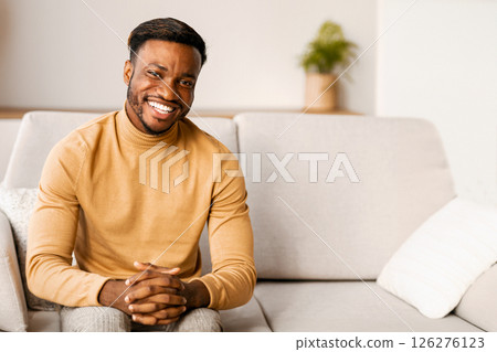 Successful Entrepreneur. Confident Black Man Smiling At Camera Sitting On Couch Indoor. 126276123