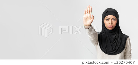 Stop Violence Concept. Serious Black Muslim Woman In Hijab Showing No With Her Hand, Tired Of Discrimination, Light Studio Background, Free Space 126276407