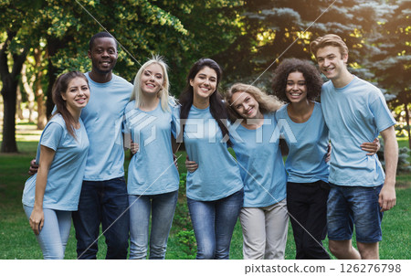 Group of happy young diverse volunteers embracing at park, ready for work, copy space Group of happy young diverse volunteers embracing at park, ready for work, copy space 126276798