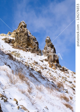 Ebisu Daikoku, a rock tower on the middle slope of Mt. Kengamine in the Nasu Mountains in Tochigi Ebisu Daikoku, a rock tower on the middle slope of Mt. Kengamine in the Nasu Mountains in Tochigi 126276853