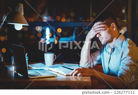Overworked Office Guy At Laptop Covering Eyes Sitting At Workplace At Night. Exhausting Job. Free Space 126277111