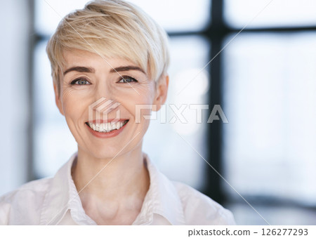 Portrait Of Happy Businesswoman Smiling Looking At Camera Posing In Modern Office. Successful Business People. Selective Focus 126277293