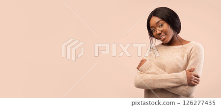 African American Woman Looking At Camera Crossing Hands Standing On Pink Background. Studio Shot African American Woman Looking At Camera Crossing Hands Standing On Pink Background. Studio Shot 126277435