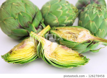 Green artichokes on white background 126278458
