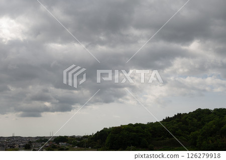 [Natural material: rainy season sky] Rain clouds covering a residential area 126279918