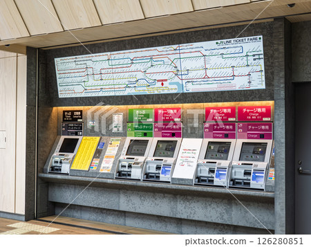 Ticket vending machine and fare table (in English) at JR Takanawa Gateway Station 126280851