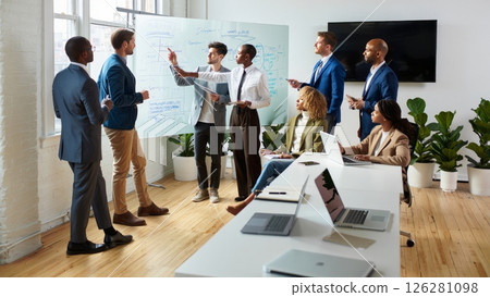 Modern Office Collaboration: Diverse Team Brainstorming in a Sunlit Workspace 126281098