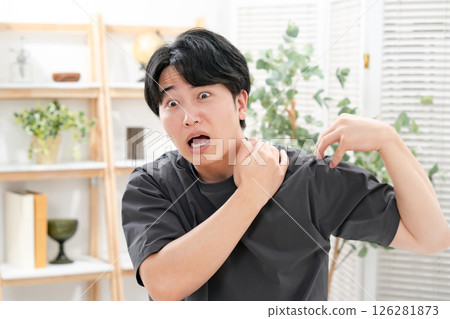 Young man, stiff shoulders 126281873