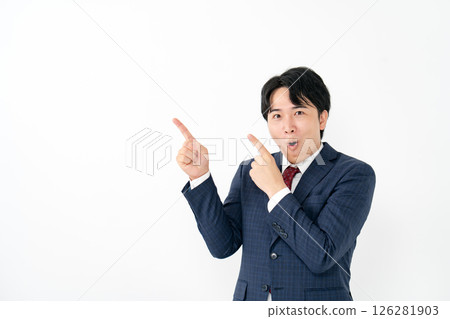 Young businessman pointing Young businessman pointing 126281903