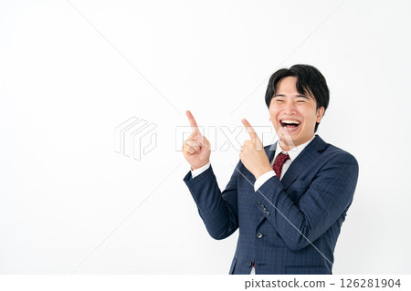Young businessman pointing Young businessman pointing 126281904