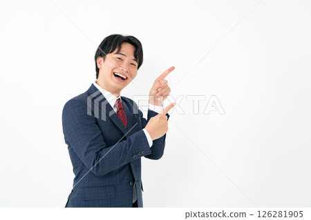 Young businessman pointing Young businessman pointing 126281905