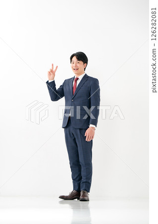 Businessman, full body, peace sign Businessman, full body, peace sign 126282081
