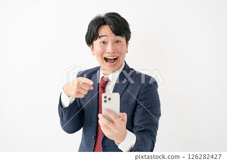Businessman smartly surprised Businessman smartly surprised 126282427