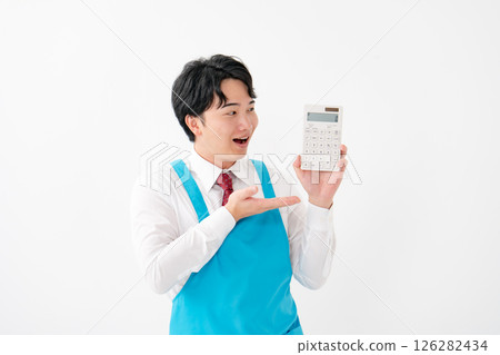Businessman, demonstration sales, calculator Businessman, demonstration sales, calculator 126282434