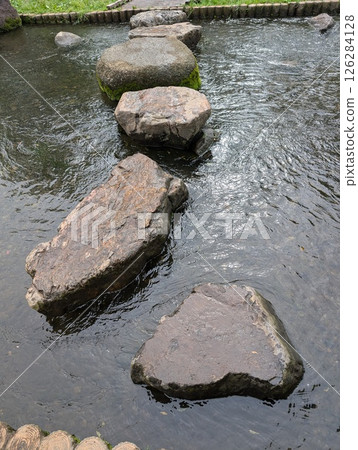 Floating stone steps on the water 126284128