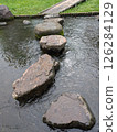 Floating stone steps on water 126284129