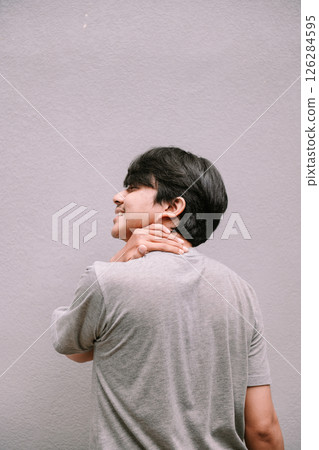 young asian man suffering from pain 126284595