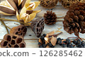 Stylish pine cones and dried flowers 126285462