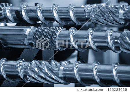 Close up scene body of the barrel screw of injection machine spare parts in the light blue scene. 126285616